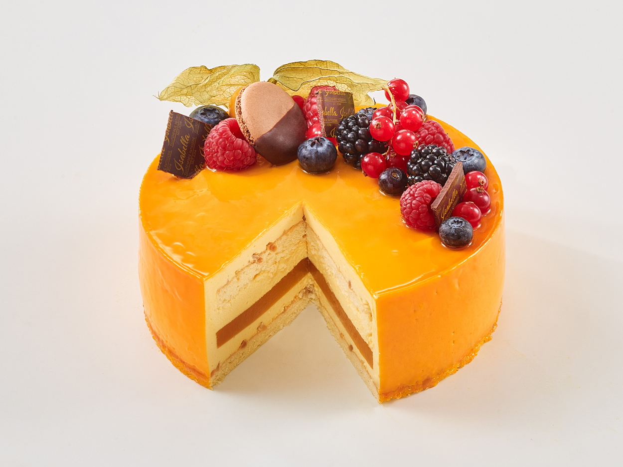 exotic-passion-glutenfreie-laktosefreie-torte-mango-maracuja-rund-angeschnitten-isabella-glutenfreie-patisserie glutenfreie, laktosefreie Exotic Passion Torte mit Mango-Maracuja, Herzform, Früchte, angeschnitten, Isabella Glutenfreie Patisserie