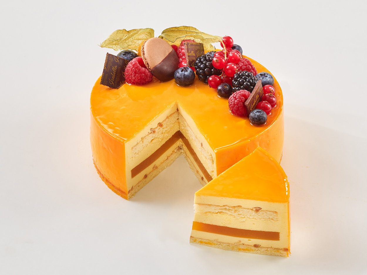 exotic-passion-glutenfreie-laktosefreie-torte-mango-maracuja-rund-anschnitt-isabella-glutenfreie-patisserie glutenfreie, laktosefreie Exotic Passion Torte mit Mango-Maracuja, Herzform, Früchte, Anschnitt, Isabella Glutenfreie Patisserie
